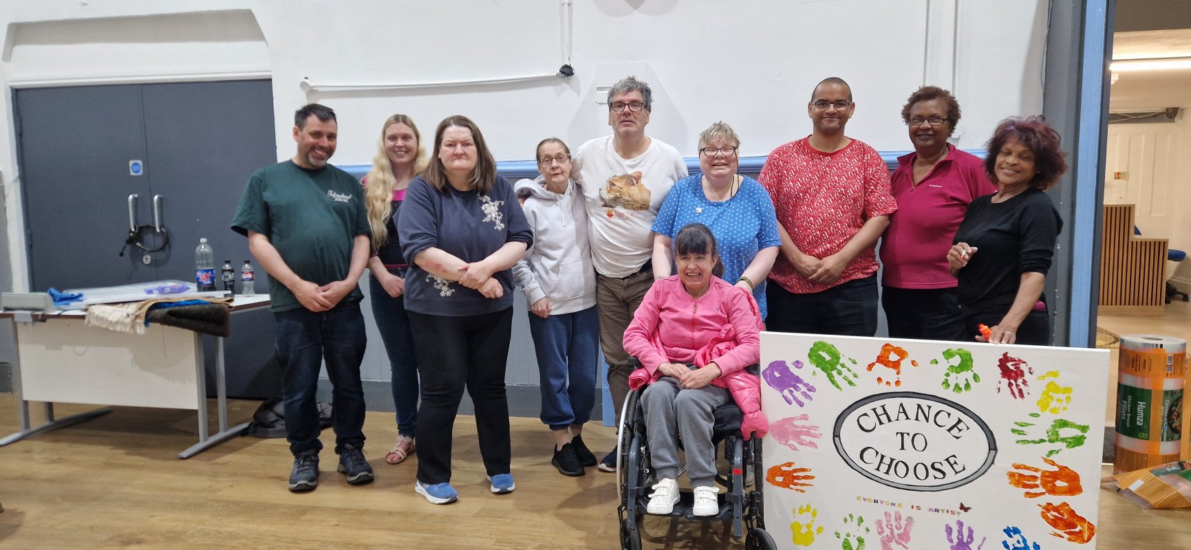 The everyone in the Group with the Chance to Choose hand paint logo with hand prints